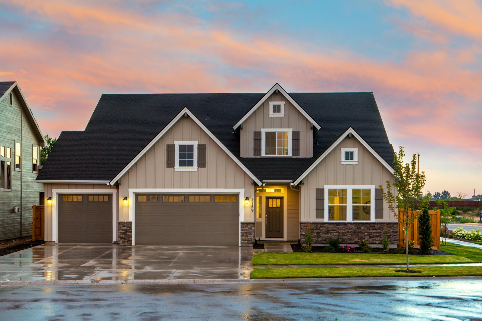 Home insurance, Charming family home in Boise, ID with a modern facade and spacious garage.